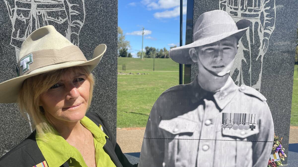 Tamworth woman Gloria Yeomans with a cardboard cutout of her uncle, Private Roy Francis Yeomans. Picture by Jonathan Hawes