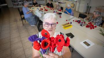 Easy Living Retirement Villas craft group member Trish Jones says her whole community has gotten behind her idea to crochet poppies for Anzac Day. Picture by Peter Hardin