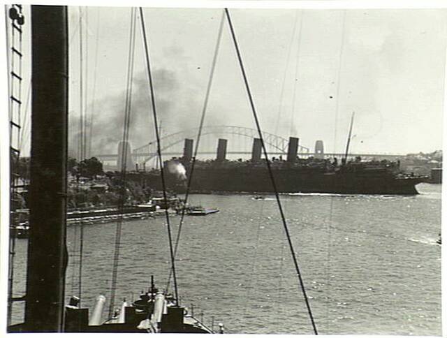 A photo taken from the RMS Aquitania as it came into port on February 27, 1943, carrying on it soldiers from the 'mighty' ninth division including Roy and his brother William. Picture supplied by the Australian War Memorial