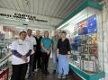 Cahills Soul Pattinson Chemist owners Pranitha and Ranjan Goli, staff Sandra Bizant and Cathy Cook, and Kevin and Wendy Smith in front of their ANZAC tribute display. Picture by NDL.