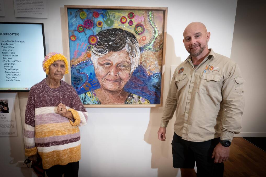 Kamilaroi Elder Aunty Yvonne Kent's sister, Lynette Kirk and one of her sons, Ben Kent are proud to see her legacy immortalised through community-led artwork. Picture by Peter Hardin