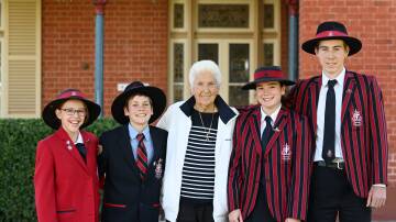 Calrossy Anglican School house captains Charlotte MacGillivray and Jeremy Scott, with Australian Olympic legend Dawn Fraser, and school captains Olivia Coombes and Tom Aiken. Picture by Gareth Gardner