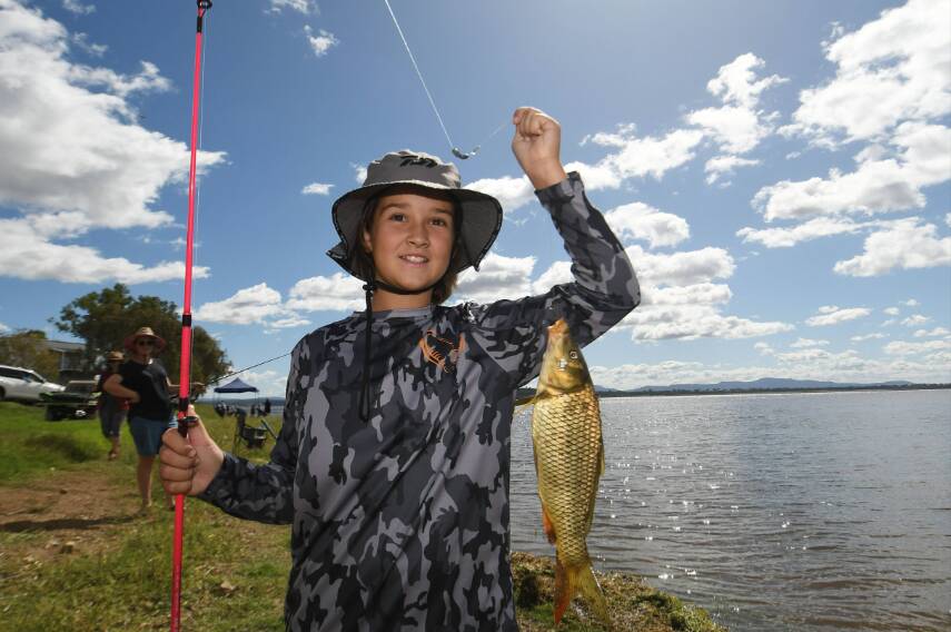 Jorja Arnold holds up an impressive catch during the 2023 Lake Keepit Carp Muster. Picture by Gareth Gardner