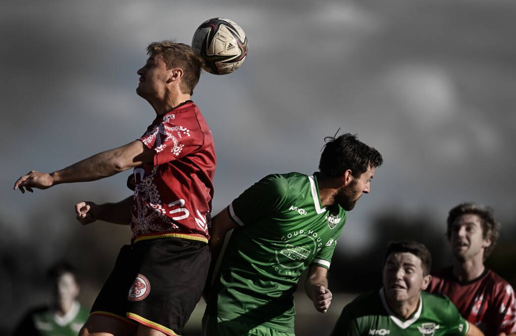 Hillvue Rovers and OVA Mushies in action. Picture by Gareth Gardner