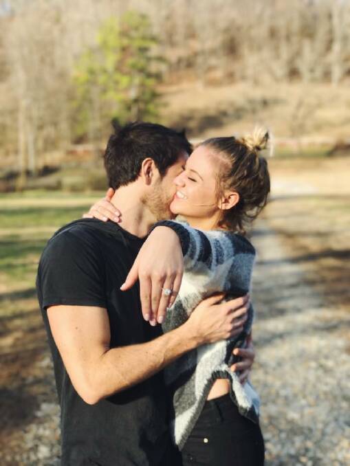 Engaged: Morgan Evans and Kelsea Ballerini in a post from Evans' Facebook page, with Ballerini showing the engagement ring.