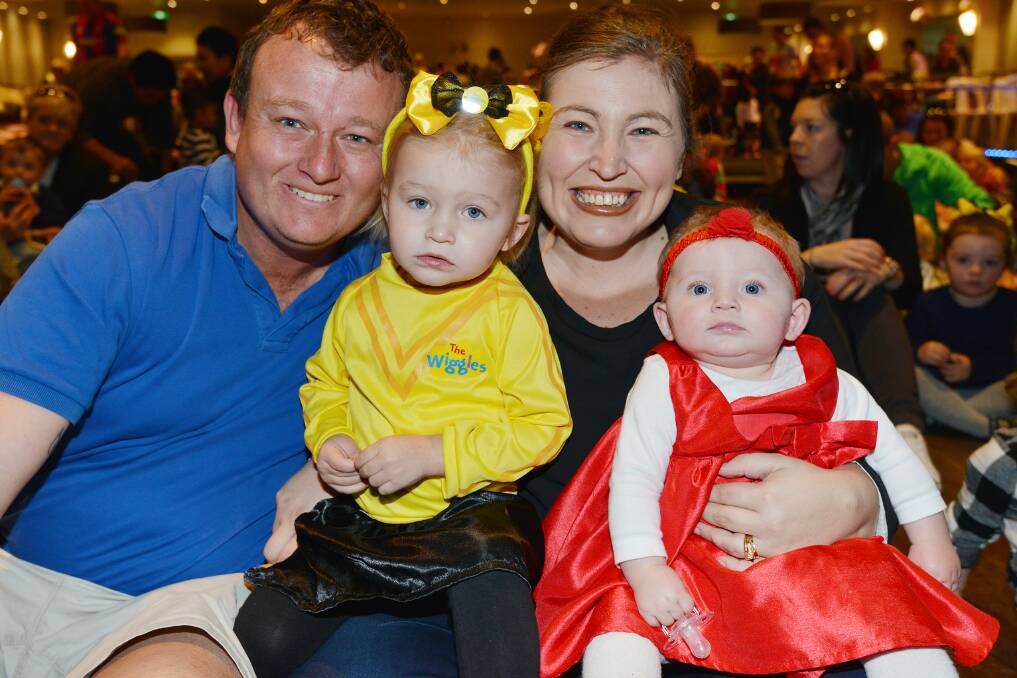 Craig, Jorja (2), Rebecca and Khloe (6 months) Balkemma from Newcastle.  Photo: Barry Smith 