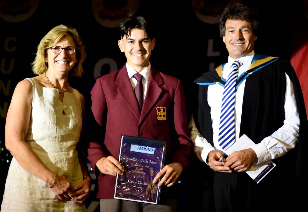 Opportunity: Casey Clarke, centre, is pictured with Mally Carter, left, from Farming for Kids and Quirindi High School, Principal, Ian Worley. Photo: Supplied.