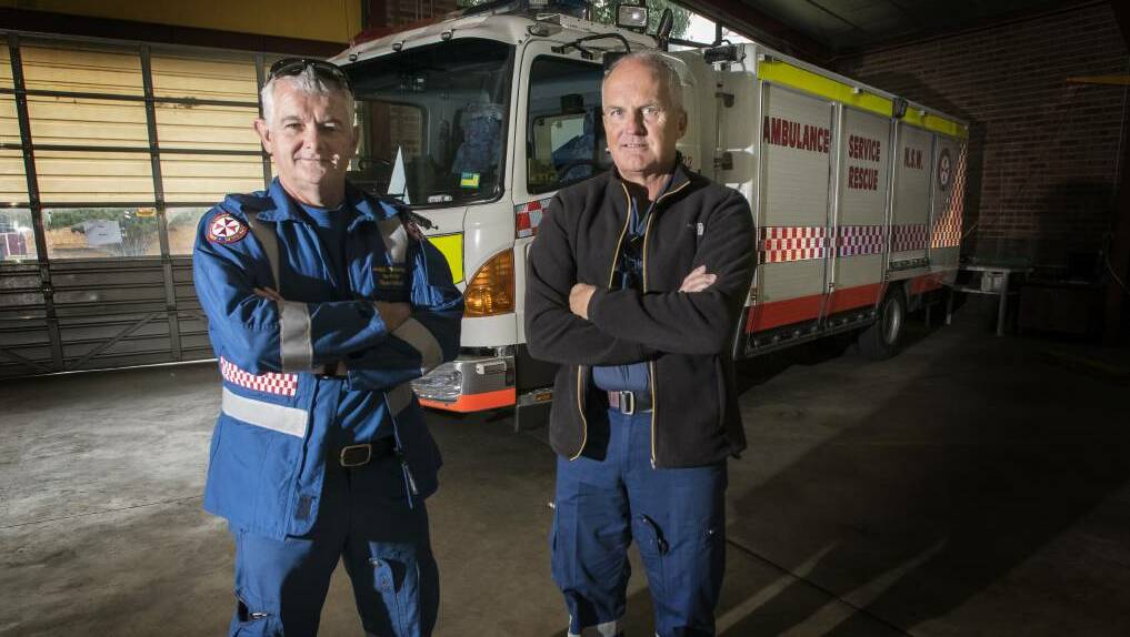 IN NEED: Tamworth paramedics James Thompson and Brian Bridges with the rescue truck. Photo: Peter Hardin 210817PHB011