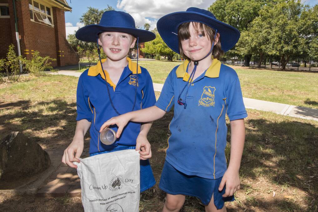 Clean Up Australia Day at Tamworth Public School: Charlie Fergonson and Matilda Carey help out. Photo: Peter Hardin 030317PHD068