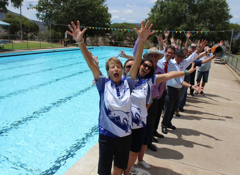 All smiles: Residents celebrate the announcement at Werris Creek pool on Monday. Photo: Supplied.