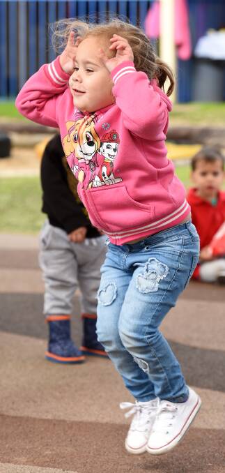 SPECIAL DAY: Deneeka Nean-Kelly bounces into celebrations for National Aboriginal and Torres Strait Islander Children's Day celebrations at Birrelee MACS Childcare Centre 