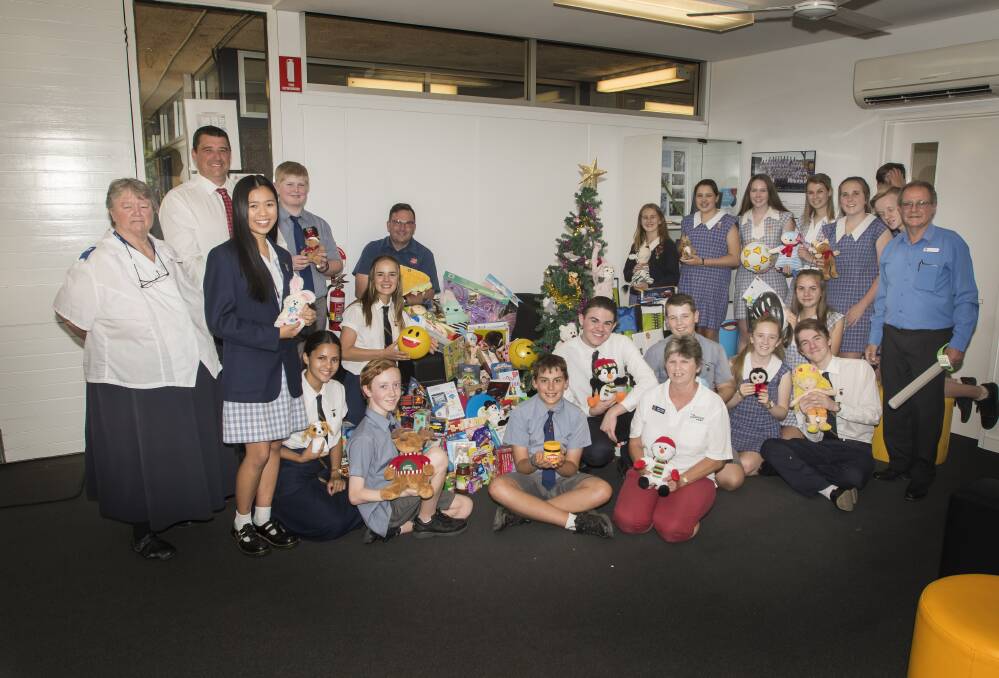 Christmas sharing: The fundraiser is in its 15th year at the school, the students keen to make everyone's Christmas a happy one. Photo: Peter Hardin. 081217PHD026
