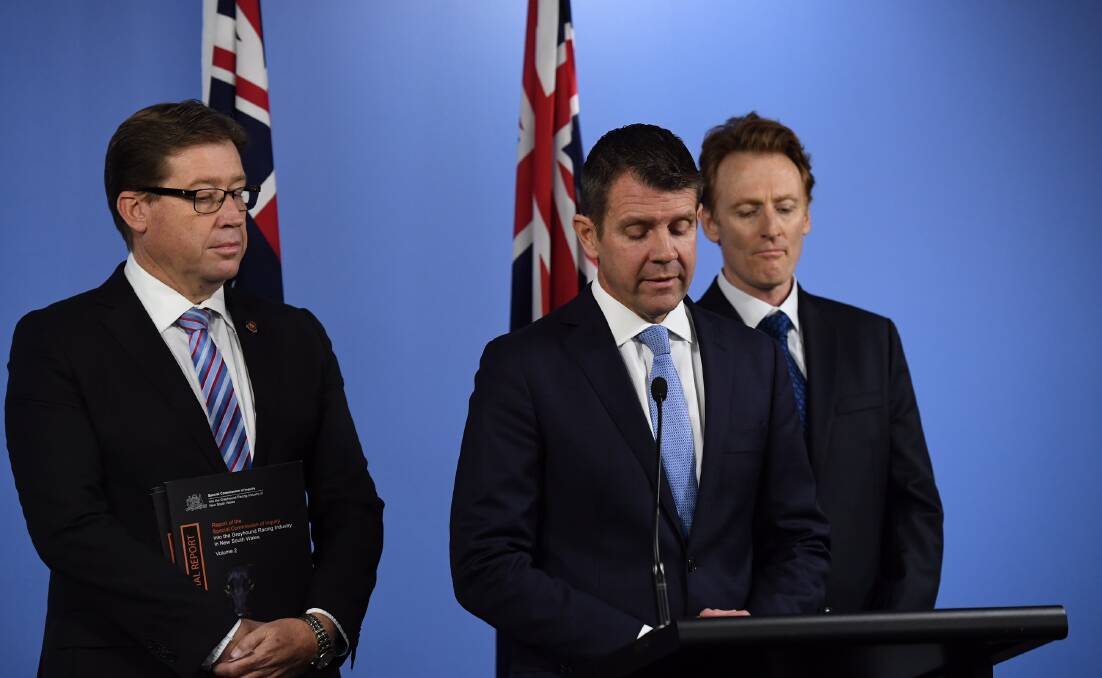  GREYHOUND BAN: NSW Premier Mike Baird and Deputy Premier Troy Grant talking on the report into the Greyhound Racing Industry. Photo: Peter Rae.