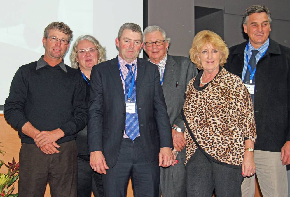 DOHNE CONFERENCE: Chris Clonan, is pictured with, from left, Darren and Jodie O'Brien, Richard Beggs and vendors Graham and Susan Coddington.