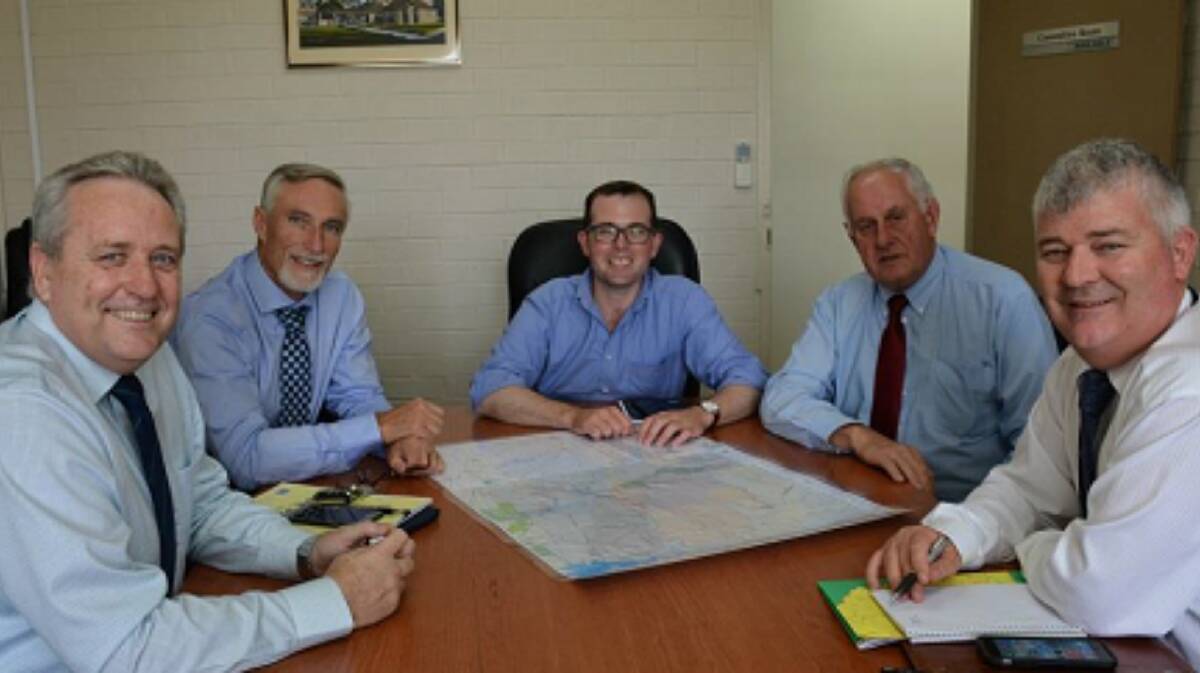 Inverell Shire general manager Paul Henry, mayor Paul Harmon with Member for Northern Tablelands Adam Marshall, ARC administrator Dr Ian Tiley and CEO Peter Dennis reviewing the boundary map