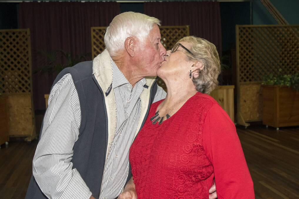SEALED WITH A KISS: It's been 60 years, but Errol and Cecilia are more in love than ever . Photo: Peter Hardin 140517PHC017