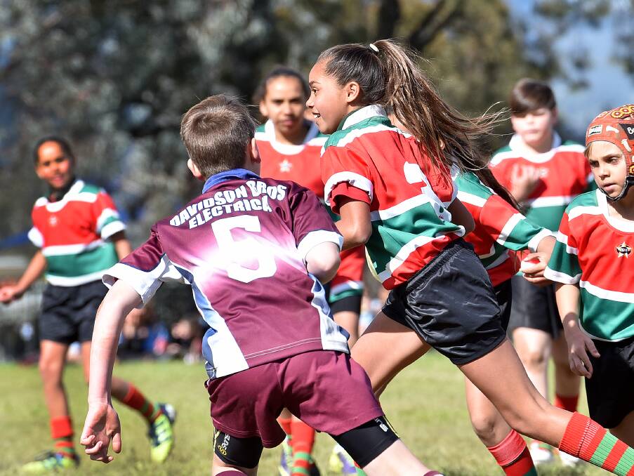 MAKING A BREAK: The boys played rugby league, while the girls matched up games of union. Photo: Gareth Gardner 260816GGD06