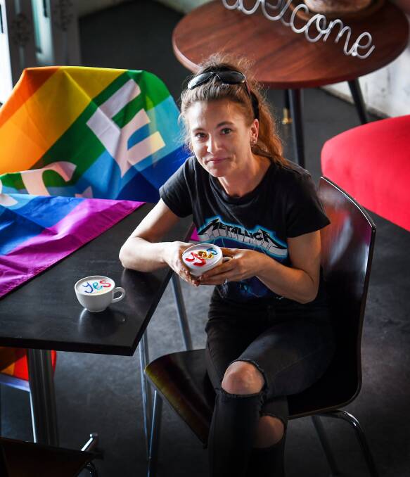 YES: Cafe 2340 owner Samantha Szyc was making rainbow coffees to celebrate. Photo: Gareth Gardner