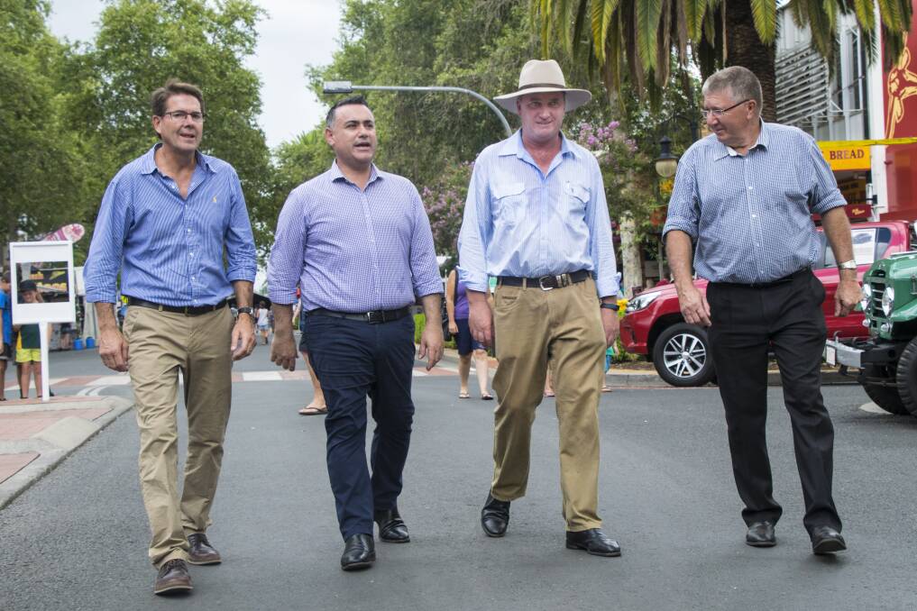 PEEL STREET WALK: John Barilaro (centre) joins locals politicians Kevin Anderson, Barnaby Joyce and Col Murray to see the sights of Country Music Festival. Photo: Jamieson Murphy 