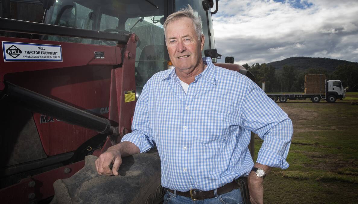 NEXT CHAPTER: These days, James Treloar can be found on the tractor at his grass farm, on the edge of Tamworth. Photo: Peter Hardin