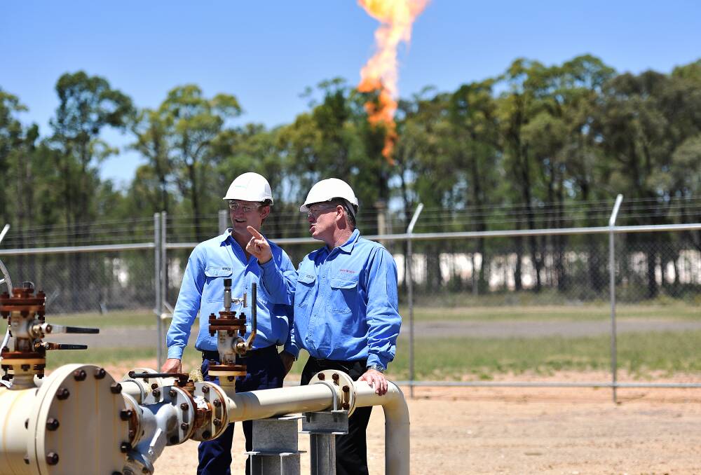 NATIONAL PRESSURE: Santos' Todd Dunn and Peter Mitchley at the Narrabri Gas Project, which the federal government wants approved to easy gas prices. Photo: Geoff O'Neill