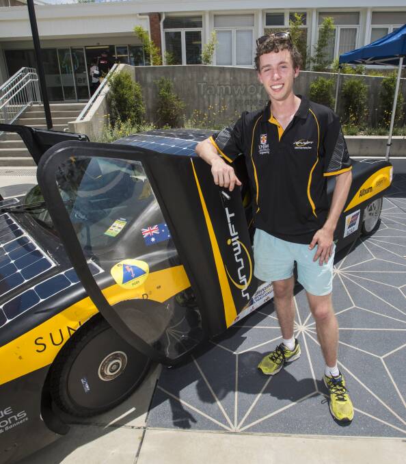 FLASHY AND FAST: Connor O'Shea with the solar-powered Eve, the fastest electric car in the world. Photo: Peter Hardin 291116PHC004