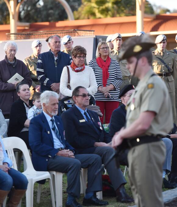 REMEMBERED: Veterans and civilians alike gathered to honour those who fought and fell in the war. Thousands attended services across the nation. Photo: Gareth Gardner 180816GGG02