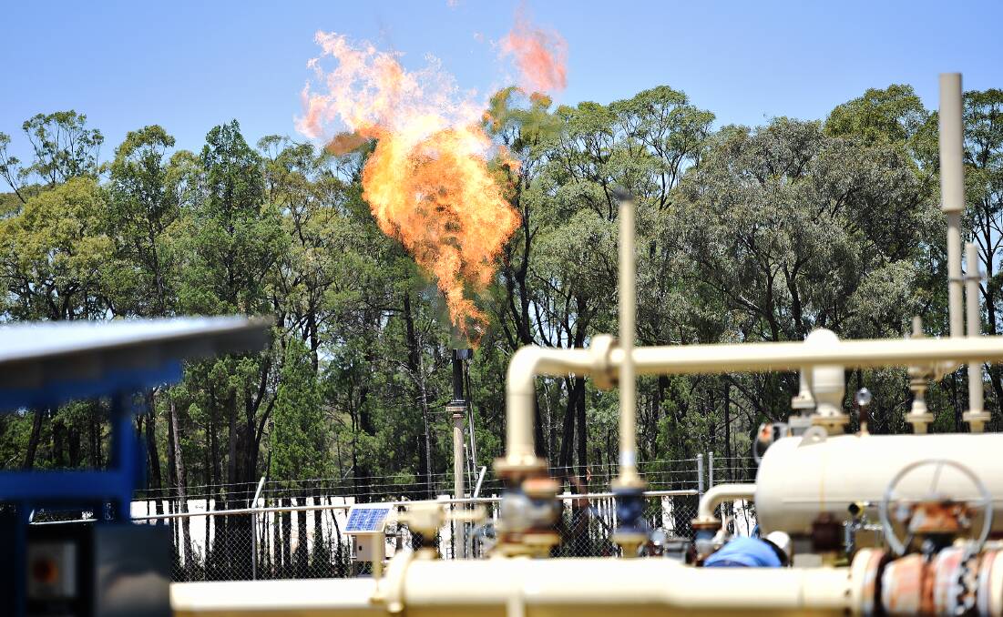 EXHIBITION: A flare goes off at Santos' Narrabri Gas Project in the Pilliga forest. The EIS is now open for public comment. Picture: Geoff O'Neill 050215GOA06