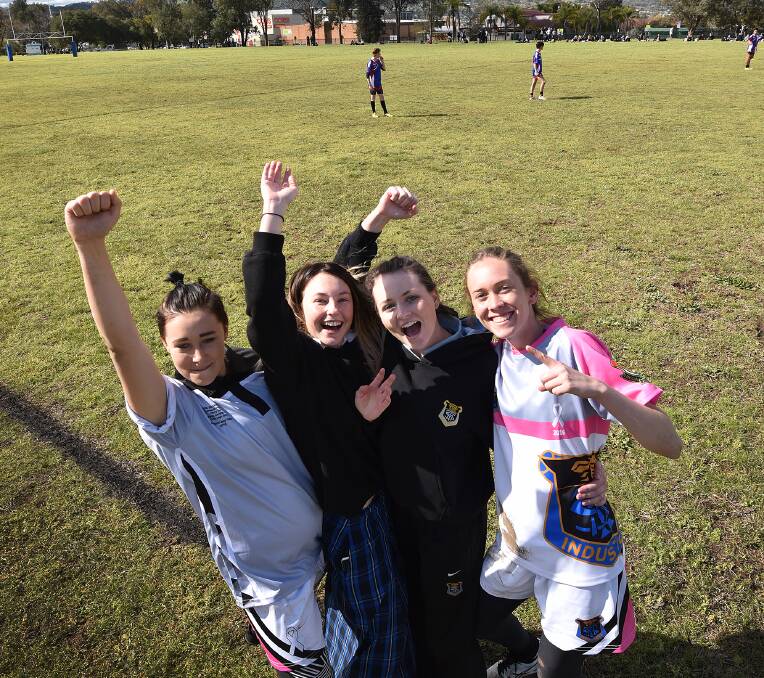 SCHOOL SUPPORT: Shiona Flemming, Natalie Deaves, Nikki Seymour and Parris Knox cheer on as the boys play. Photo: Gareth Gardner 260816GGD04