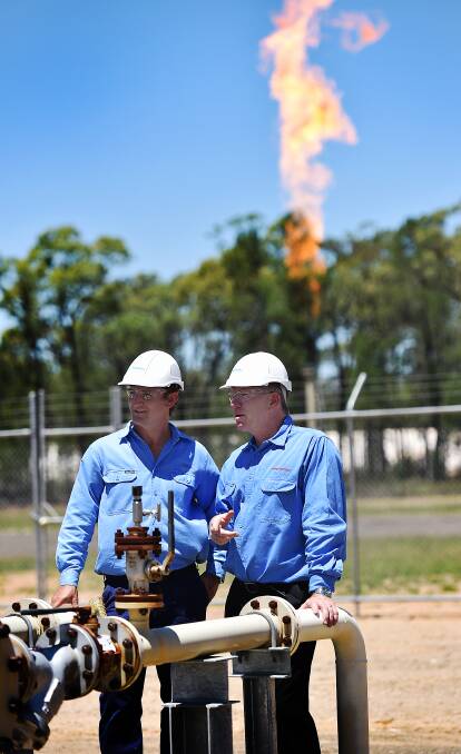 KEY DOCUMENT: Santos' Todd Dunn and Peter Mitchley at the Narrabri Gas Project, which the company has just submitted its EIS for to the government. Photo: Geoff O'Neill