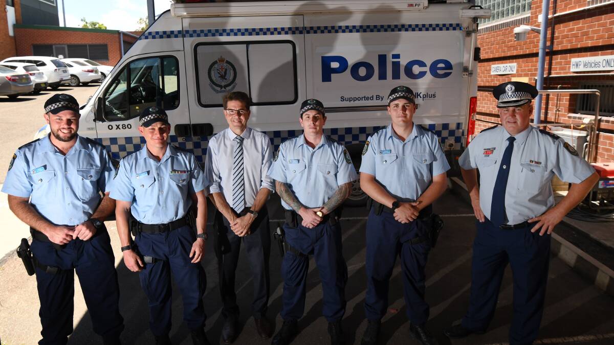 Fresh faces: Probationary Constables Bo, David, Rowan and Joseph with Tamworth MP Kevin Anderson, middle, and Oxley Acting Superintendent Jeff Budd, far right, at Tamworth Police Station as they finished their induction to start their new careers. Photo: Gareth Gardner