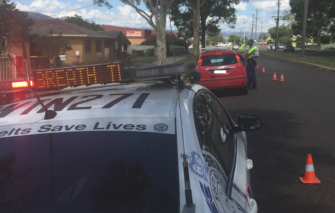 Cop blitz: Highway patrol officers carry out random breath testing during Operation Safe Arrival in Tamworth. Photo: Breanna Chillingworth