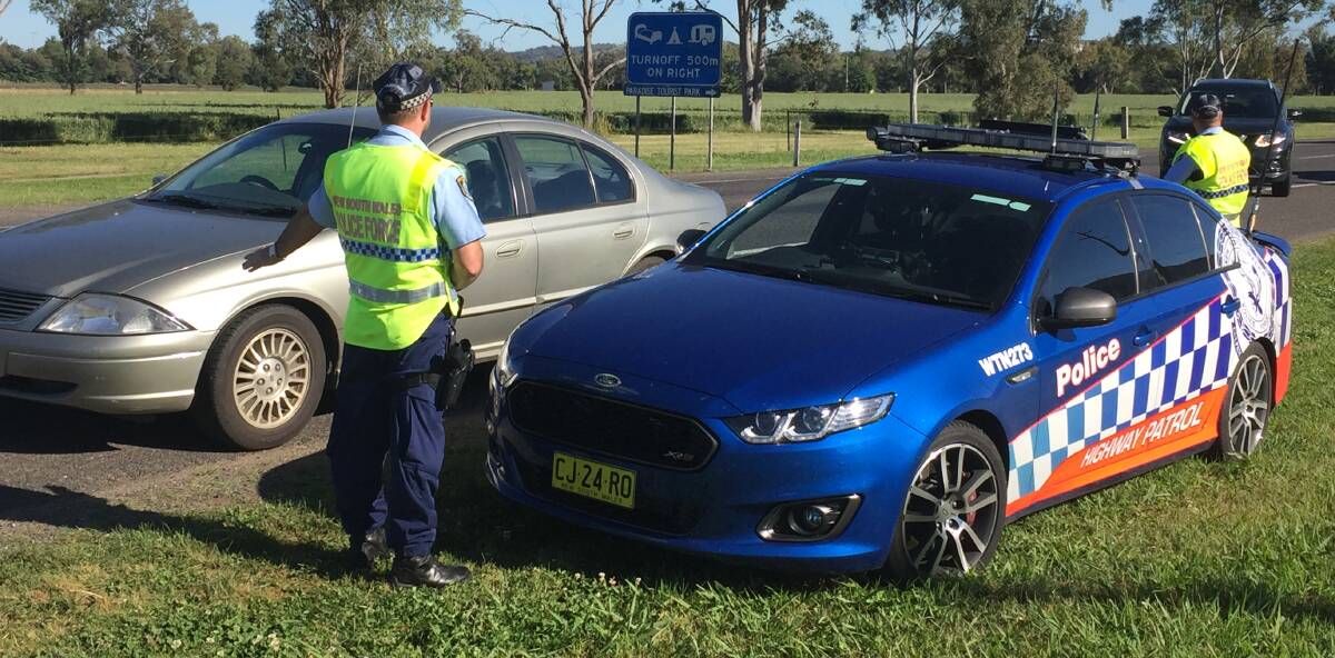 Roads blitz: Highway patrol officers breath test drivers along Scott Rd, Tamworth during Operation Drink Drive 2. 