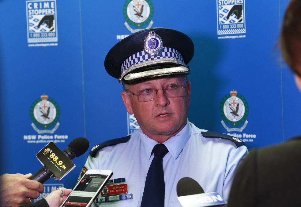 Public appeal: Oxley Chief Inspector Phil O'Reilly said police have released a computer-generated image of a man they want to speak with following Tuesday morning's attempted armed hold-up at the Caltex Service Station off Marius St. Photo: Gareth Gardner 