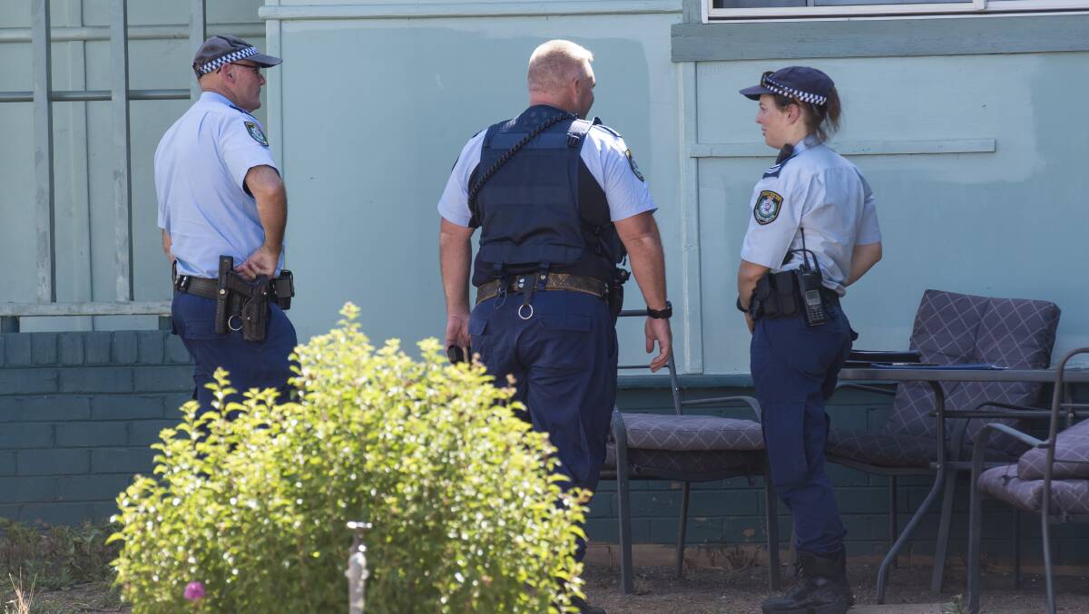 Crime scene: Police seized a knife at the house. Photo: Peter Hardin
