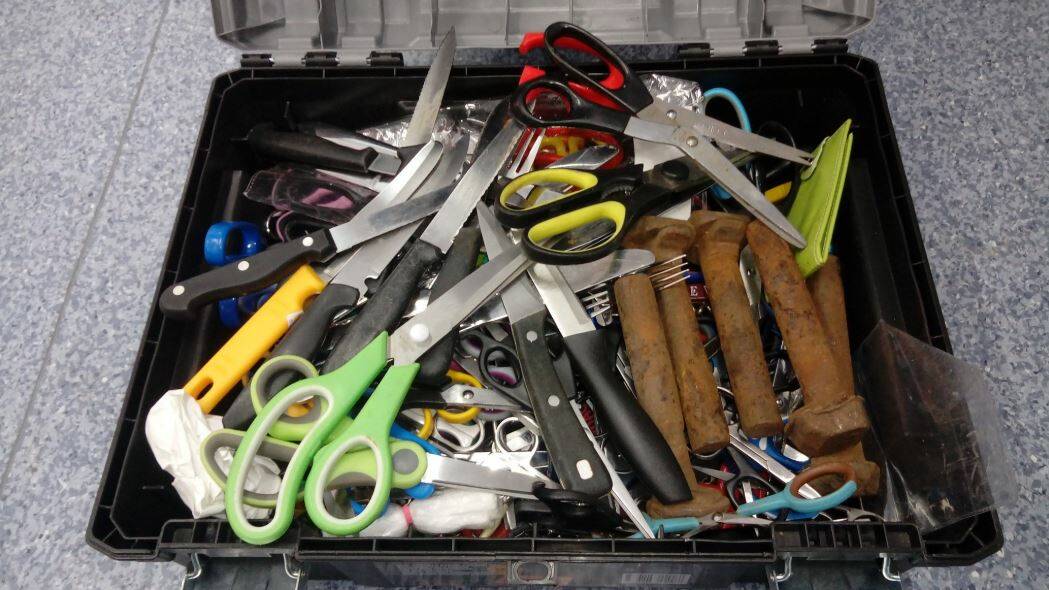 Weapons haul: Some of the dangerous goods including knives and rail pins stopped and seized by security at Tamworth Airport this month. Photo: Tamworth Airport