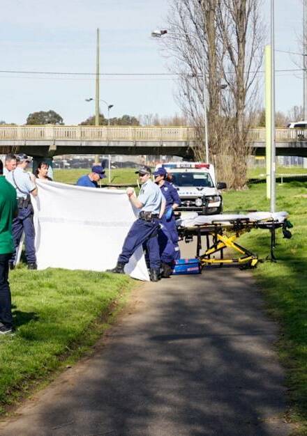 Tragedy: Police and paramedics at the scene of the drowning in the Creeklands area, in Armidale, on September 11, 2016. Photo: Matt Bedford