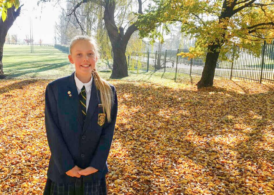 Talented writer: Ben Venue Public School captain Neve Crotty has won the primary school division of the Henry Lawson Festival's verse and short story competition for her piece, Helpless. 
