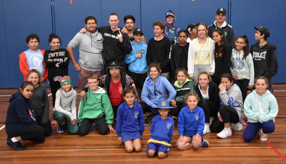 Fighting fit: The Nanyapura boxing program is in its tenth week and has seen more than 80 kids turn up some mornings to box with police and mentors. 