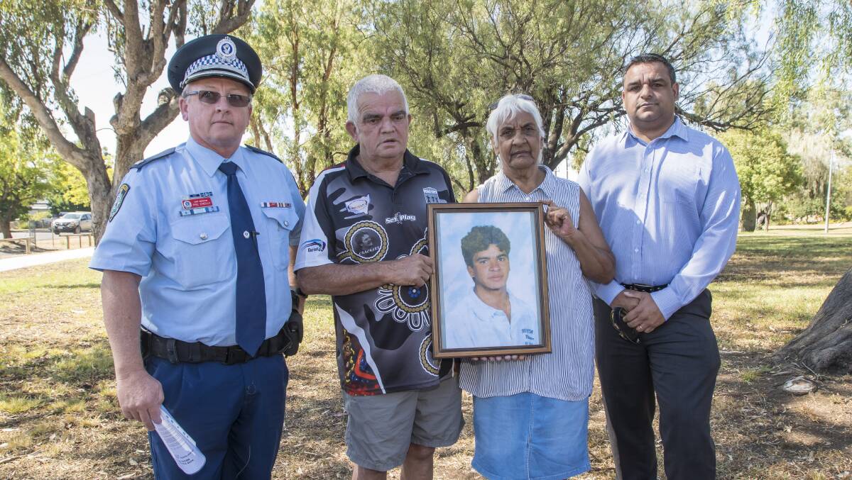 Fresh appeal: Oxley Chief Inspector Phil O'Reilly, left, with Stephen's father, Stephen, mother, Margaret, and brother, Jason, in Quirindi on Friday. Photo: Peter Hardin