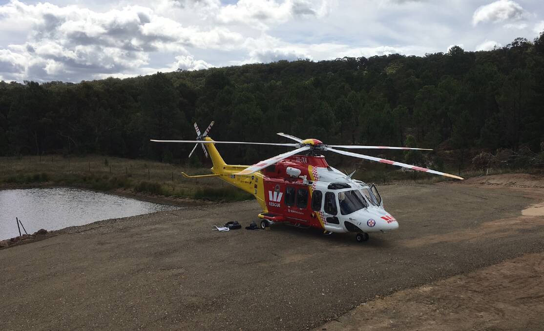 Chopper lift: The Westpac Rescue Helicopter at the scene near Uralla. 