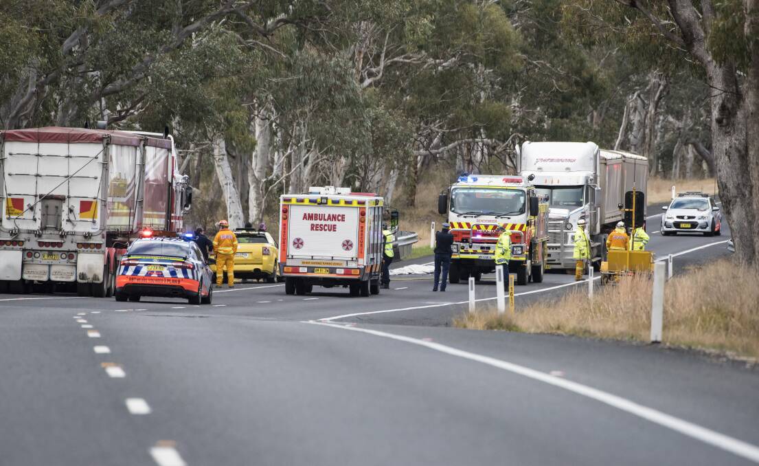 Fatal scene: Emergency services examine the crash site north of Bendemeer on Wednesday afternoon. Photo: Peter Hardin