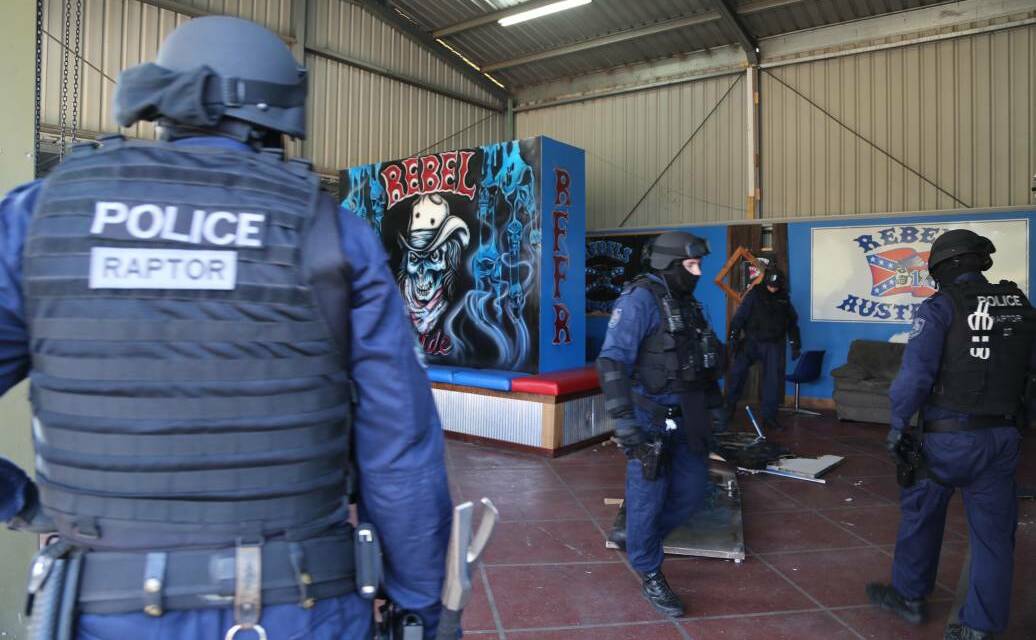 Rebels bust: Strike Force Raptor - the state's gangs squad - and Tamworth police dismantle the OMCG's clubhouse in East Tamworth on March 10, 2015. Photo: NSW Police