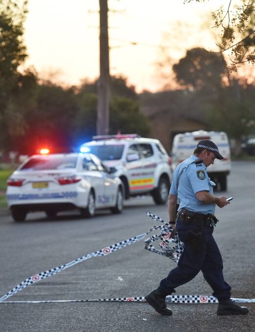 NO BAIL: A police officer at the scene of the alleged stabbing in Coledale last week. Aubrey Flick remains in custody charged with attempted murder. Photo: Gareth Gardiner 