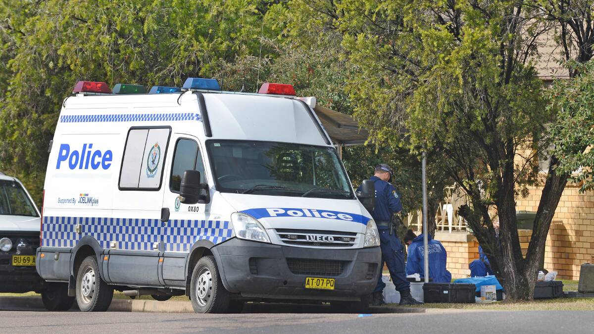Street fight scene: Specialist forensic police examine the Bilkurra St unit in Tamworth in May, 2015 following Mr Matthews' death. Photo: Barry Smith