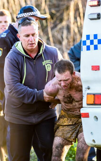 Captured: Oxley police surrounded the Peel River in Tamworth in August to arrest Thomas Michael Gould, who jumped in the water. Photos: Peter Hardin, Gareth Gardner