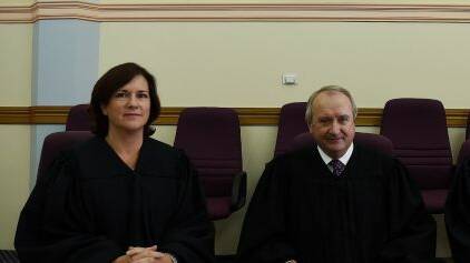 New position: Magistrate Julie Soars, pictured left with Chief Magistrate Graeme Henson, during her swearing in in Sydney last year. Photo: Kate Geraghty