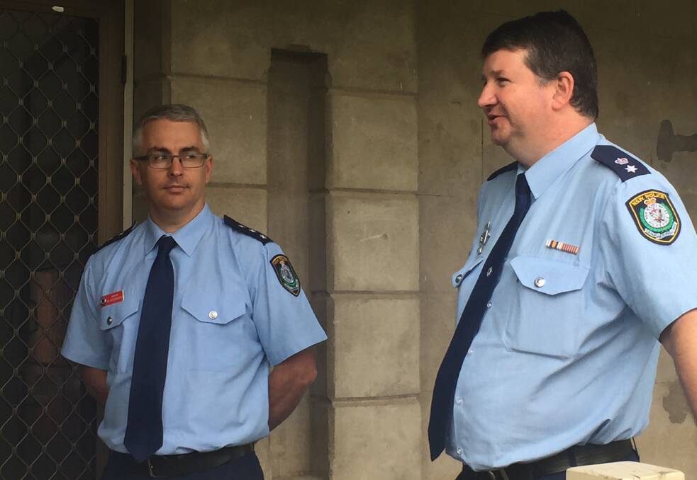 On the road: New England Superintendent Scott Tanner this week with Glen Innes officer-in-charge Inspector Matthew Hemsworth on a road trip from Armidale to Tenterfield. Double demerits runs until midnight on Monday.