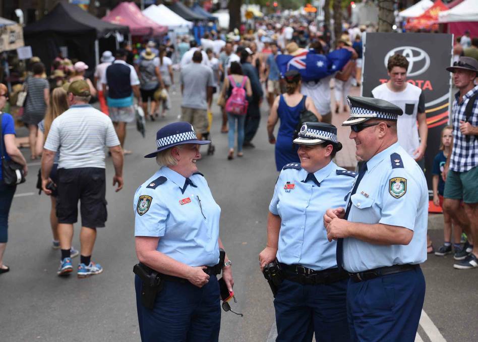 Flashback: Oxley Acting Superintendent Jeff Budd, pictured right, talking with Detective Chief Inspector Denise Godden and Inspector Kylie Endemi during the 2017 festival which was declared one of the safest in history. Photo: Gareth Gardner