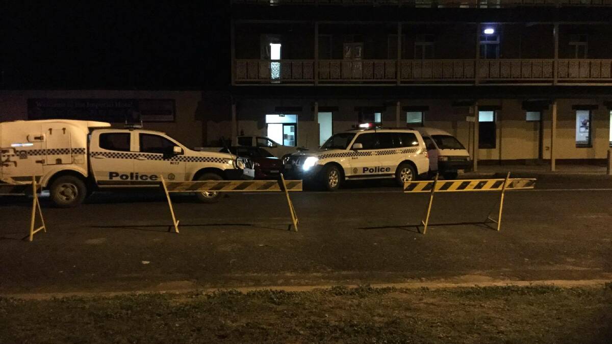 Crime scene: Police have cordoned off part of the Imperial Hotel in Rose St, Wee Waa on Tuesday night after a police operation. Photo: Supplied